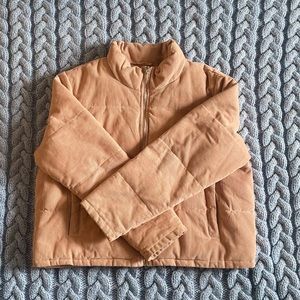 Blush pink puffer jacket , suede material, goes right up to your waistline